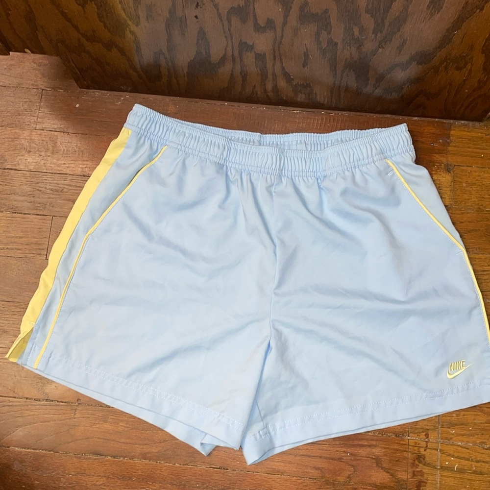 Light blue and yellow Nike athletic shorts